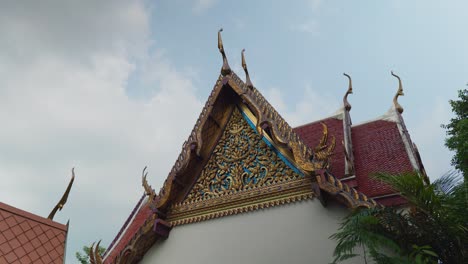 4k cinematic travel religious footage of the temple of the emerald buddha wat phra kaew in bangkok, thailand on a sunny day