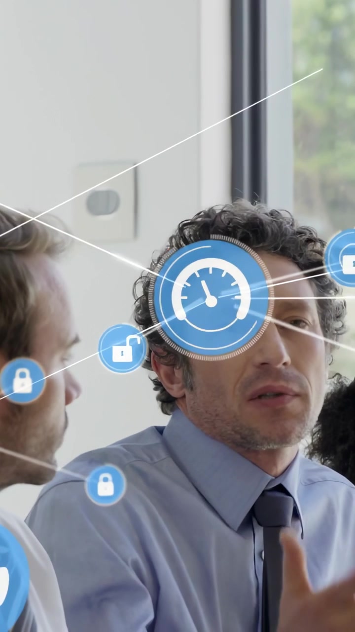 Video verticale: Responsabile aziendale che alza la mano, avviando la diffusione di icone UI blu, mentre guida il team che applaude.