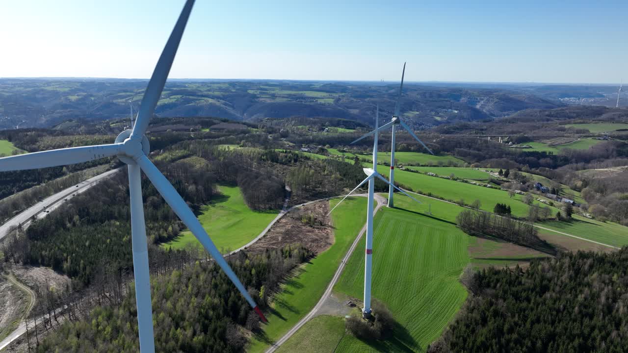 wind energy, wind turbine, green landscape, close up view. Renewable energy resources, nature energy. Aerial view.