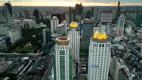 bangkok's thailand aerial city view of famous skyscrapers and business center at sunset, southeast asian metropolitan downtown