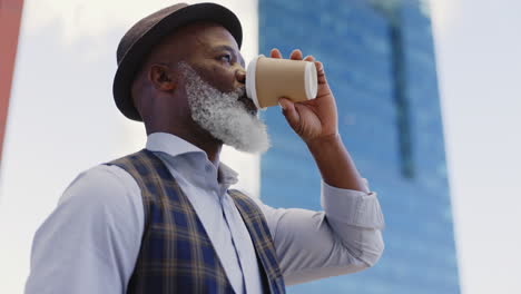 black senior businessman, coffee