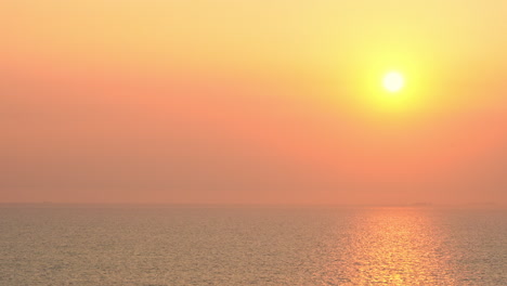 glorious golden sunset over the sea, orange, and red color sky during sundown in exotic bali