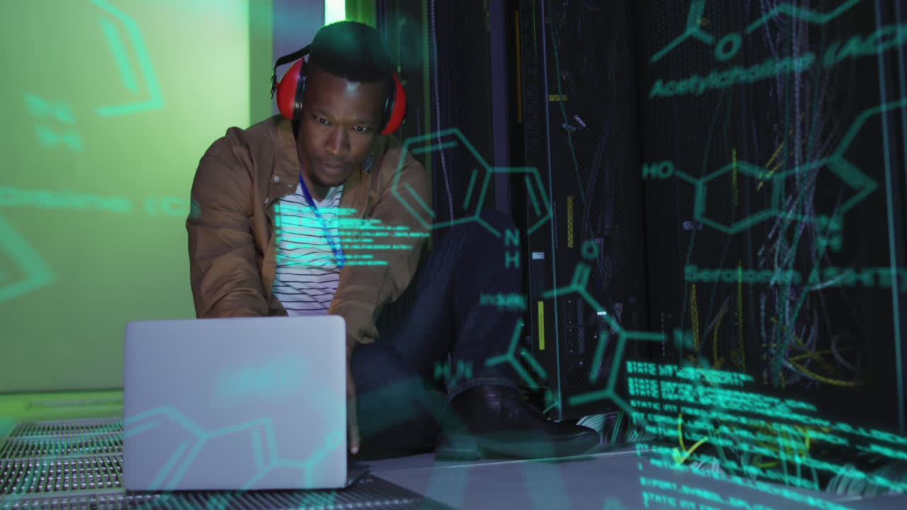 Animation of molecule structures, computer language, african american man with laptop in server room