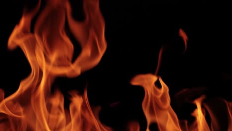 Flames-of-fire-on-black-background-in-slow-motion