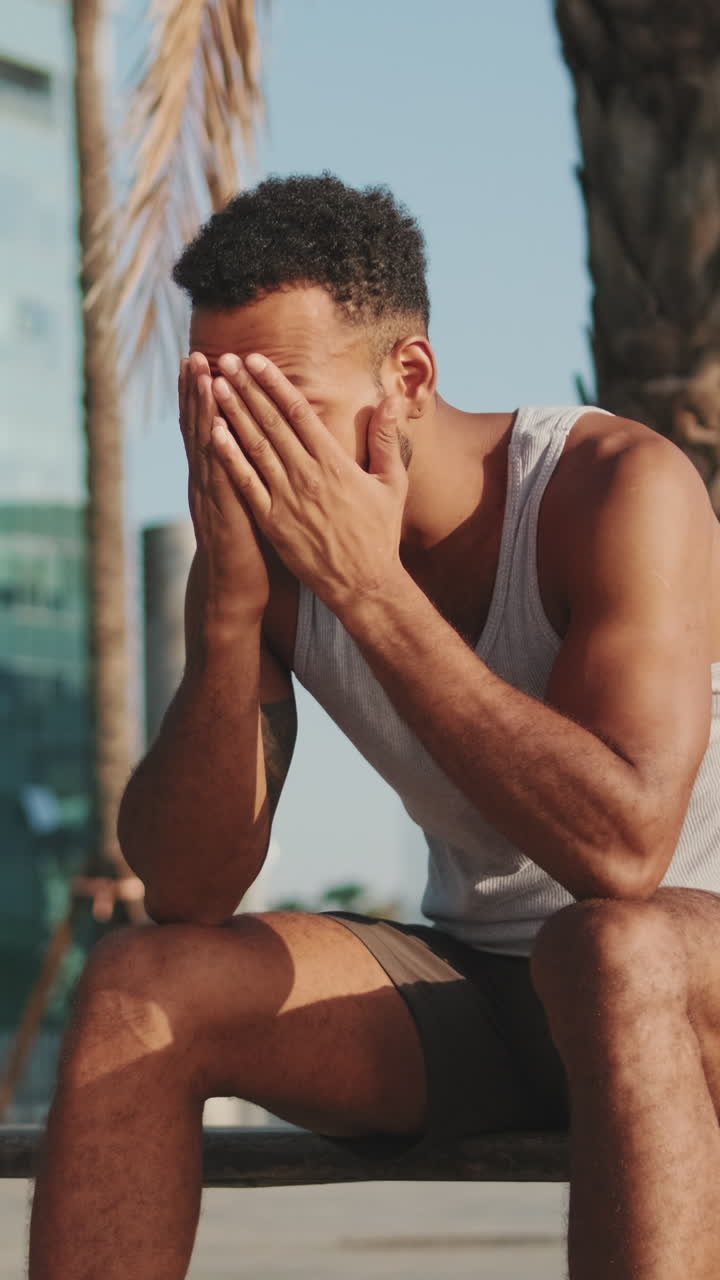 Man Sitting and Relaxing Outdoors