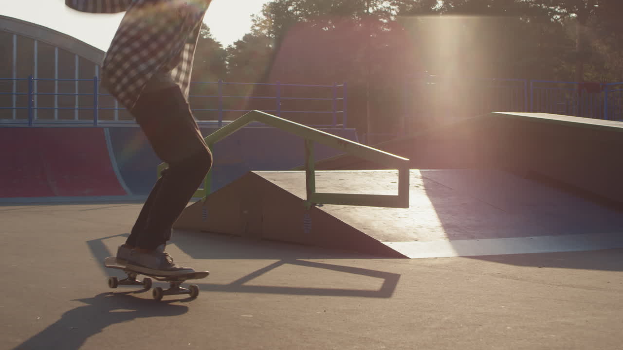 Slowmo of Teenager Doing Kickflip in Skatepark