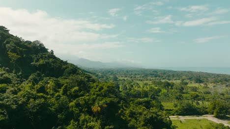 Aerial-view-flying-over-the-mountains-and-sea,-Colombia,-la-guajira