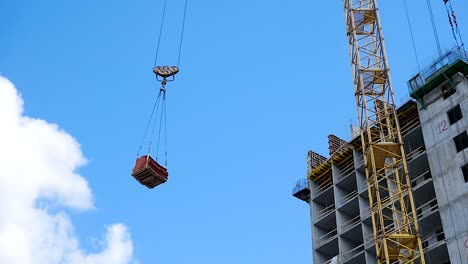 construction site with crane lifting materials