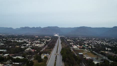 aerial shot of faisal mosque islamabad from distance - a view of islamabad city from islamabad highway