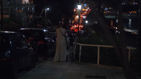 woman having evening walk with baby and elder son
