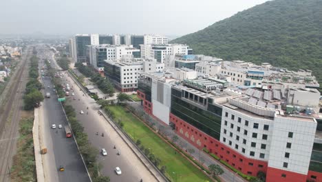 highway drone shot near a corporate buildings