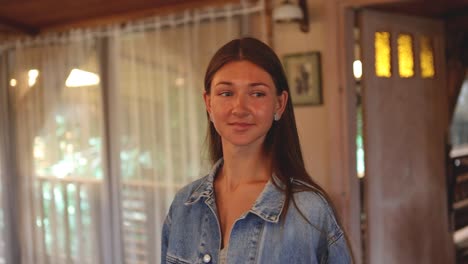 Young-attractive-woman-walking-up-to-a-fancy-diner-ready-table-at-a-restaurant