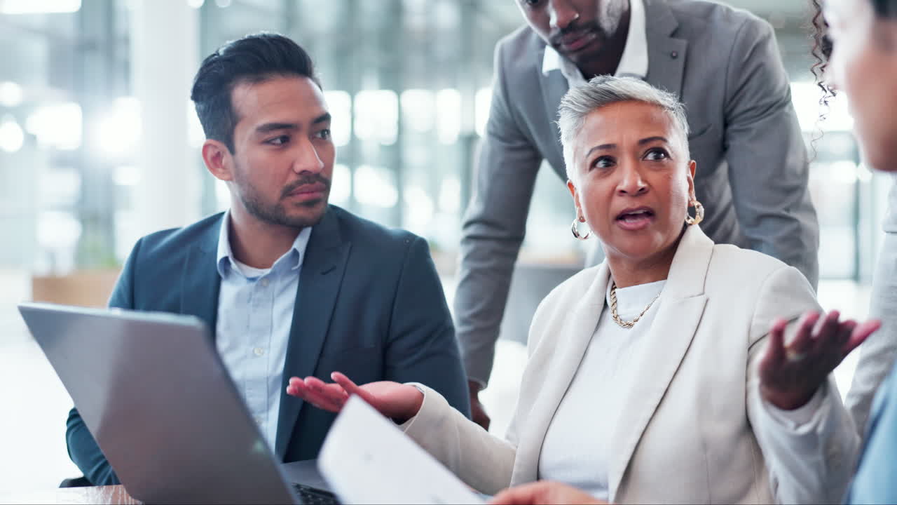 Laptop, mature woman or business people in meeting