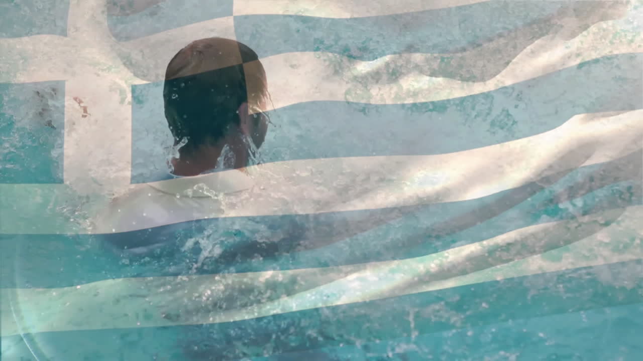 Swimming in ocean waves, man with Greek flag animation overlaying background