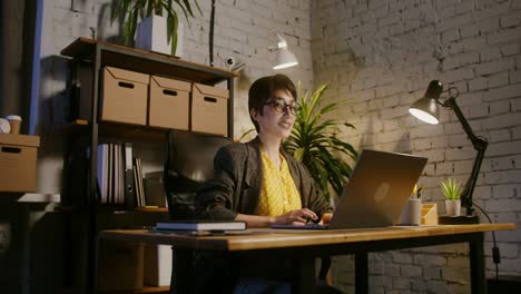 woman working late night at home