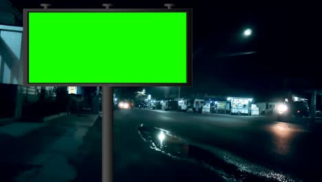 street billboard green screen or chroma key with time lapse traffic background. seamless loop for mock up advertisement