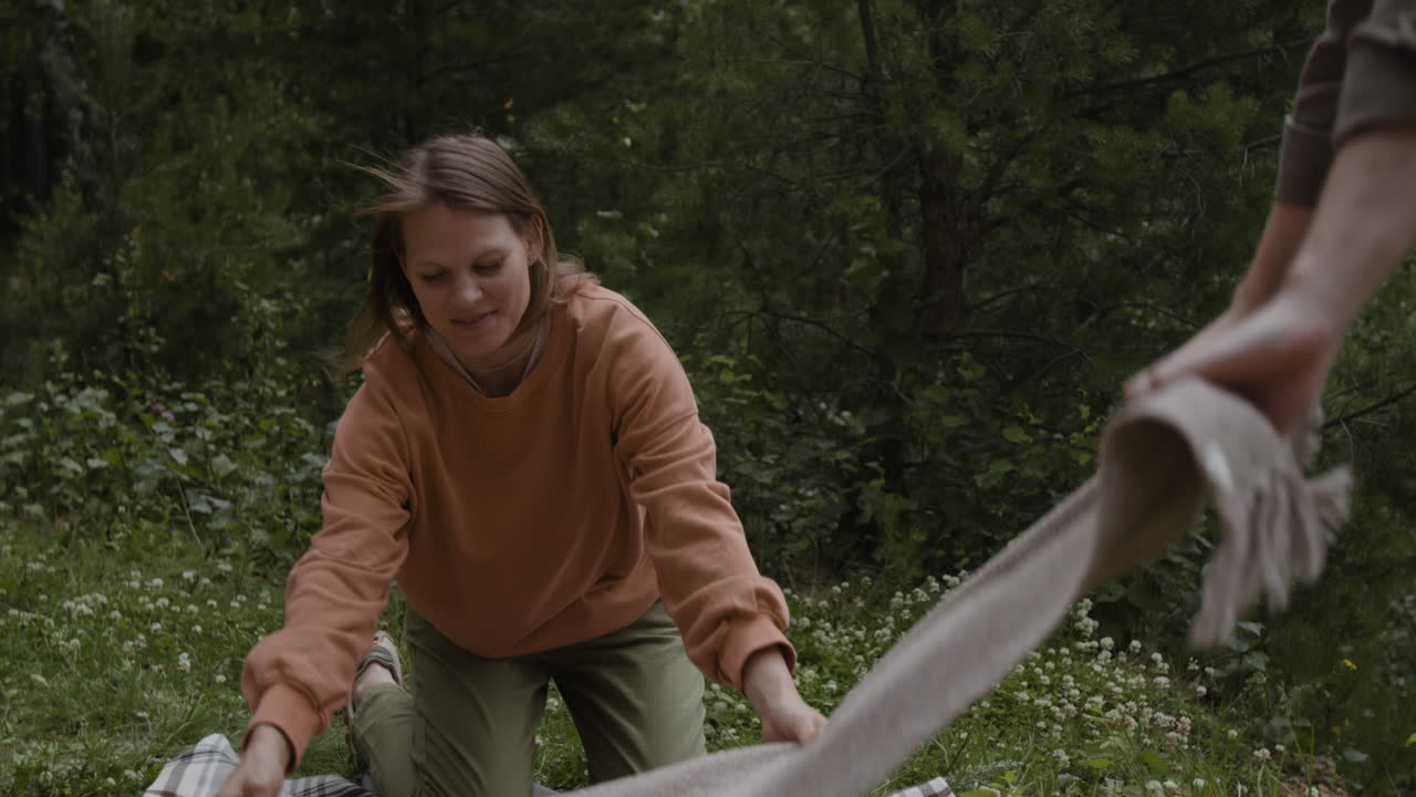People having a picnic in the forest