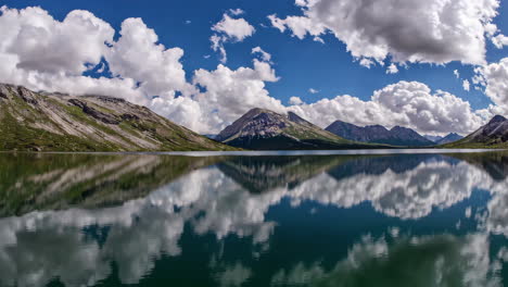 Serene Mountain Lake with Clouds Reflected