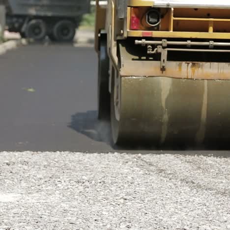 road roller laying a new asphalt