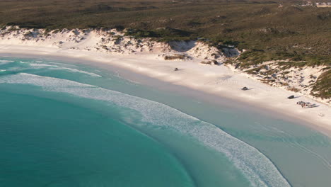 Aerial-view-of-Beautiful-Sandy-Beach-with-parked-cars-during-sunny-day---Wharton-Bay,-WA,-Australia