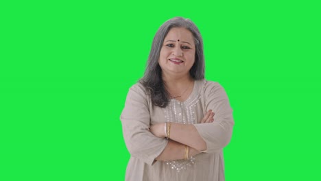 Happy-Indian-old-woman-standing-crossed-hands-Green-screen