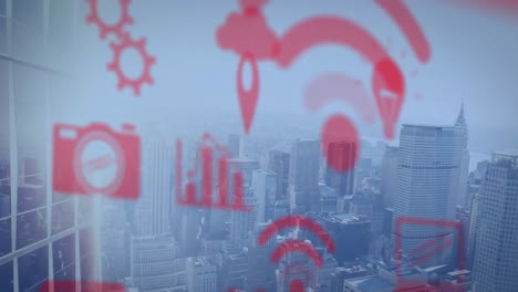 Animation-of-multiple-digital-icons-floating-against-aerial-view-of-cityscape