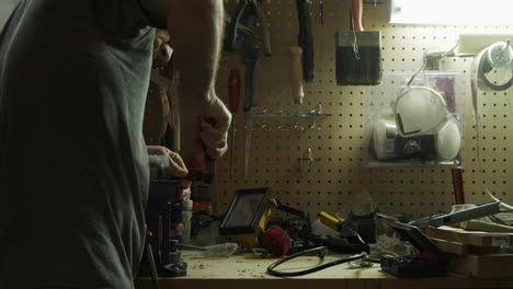 craftman in a home workshop. 4k