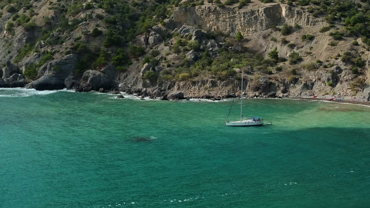 Scenic Coastal View with Yacht