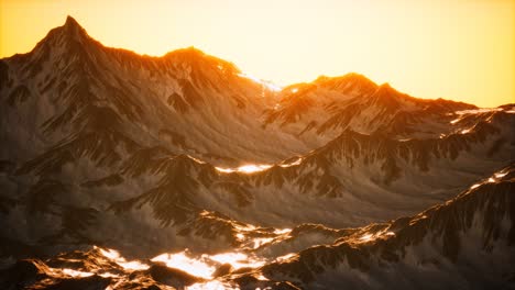 aerial view of the alps mountains in snow