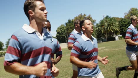 Rugby-players-running-on-the-field-4K-4k