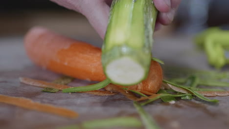 scrapping  and chopping zucchini and carrot