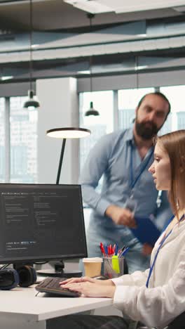vertical video friendly coworkers helping junior dev code ai algorithms to debug software