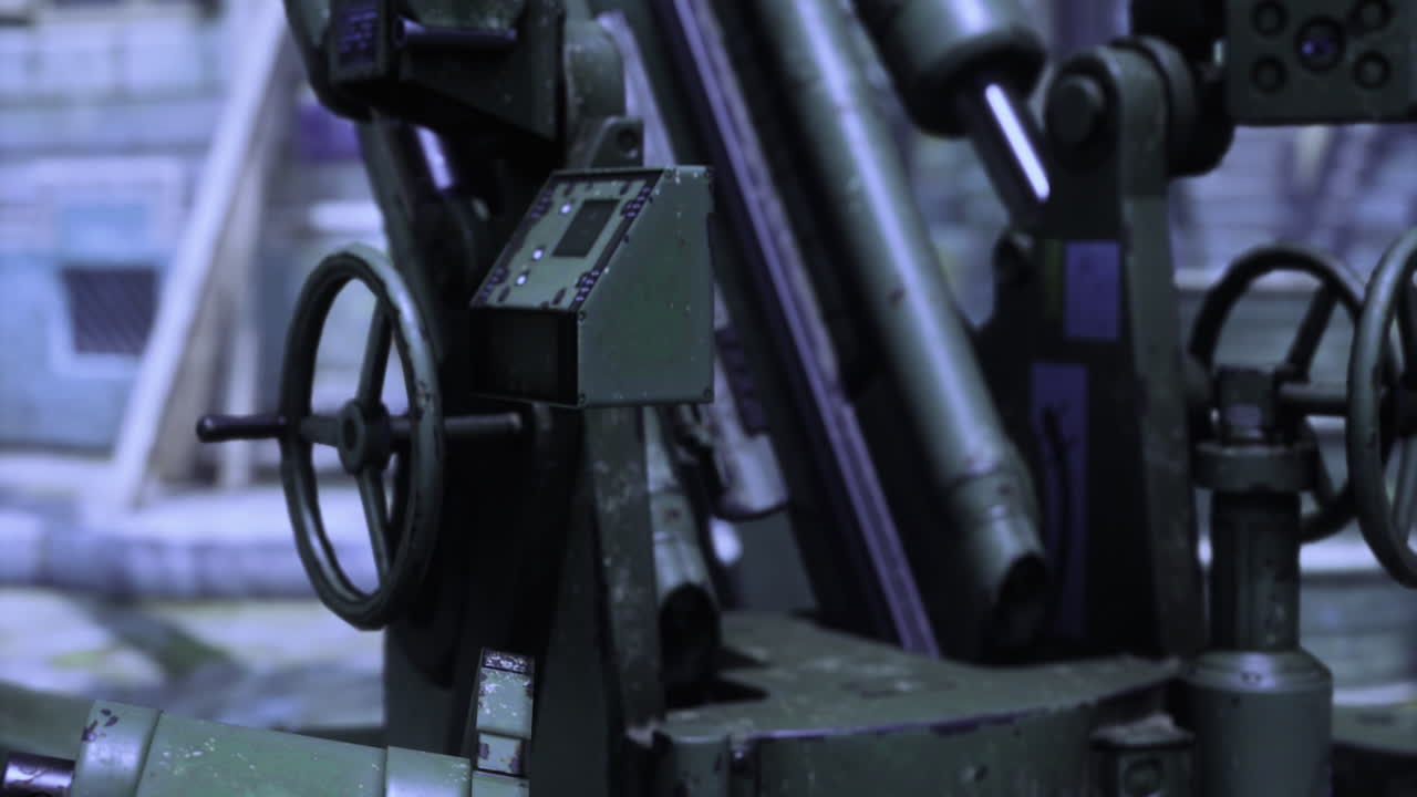 Machinery and weaponry coalesce in a dimly lit industrial setting