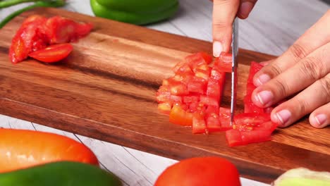 chopping tomatoes