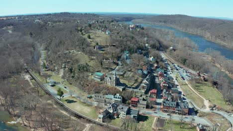 aerial view of a small town nestled in a mountain valley, with scattered homes under a clear sky, harpers ferry west virginia usa