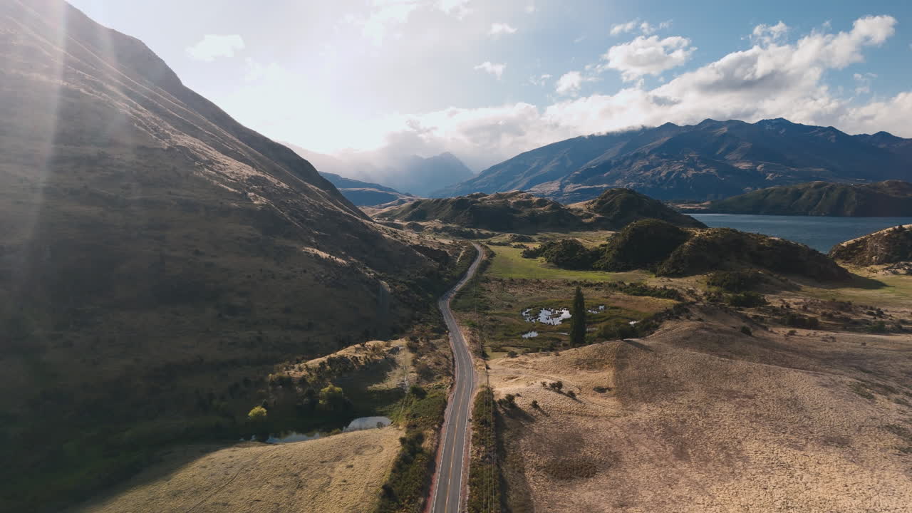 Scenic Mountain Road with Lake View