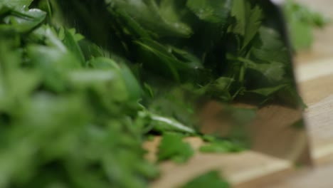 cutting parsley with a knife