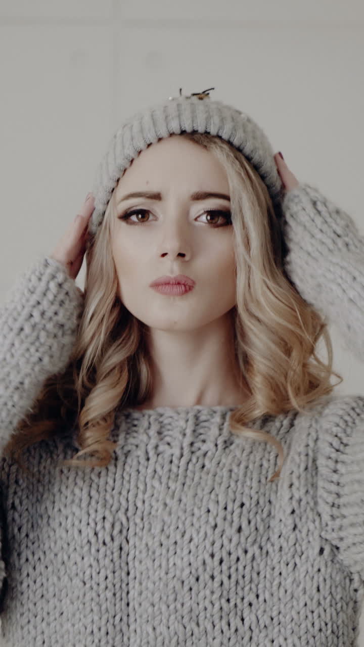 Beauty Fashion surprised Woman portrait. Beautiful girl model with a beautiful make-up came out. Emotions. Isolated over white background Vertical video