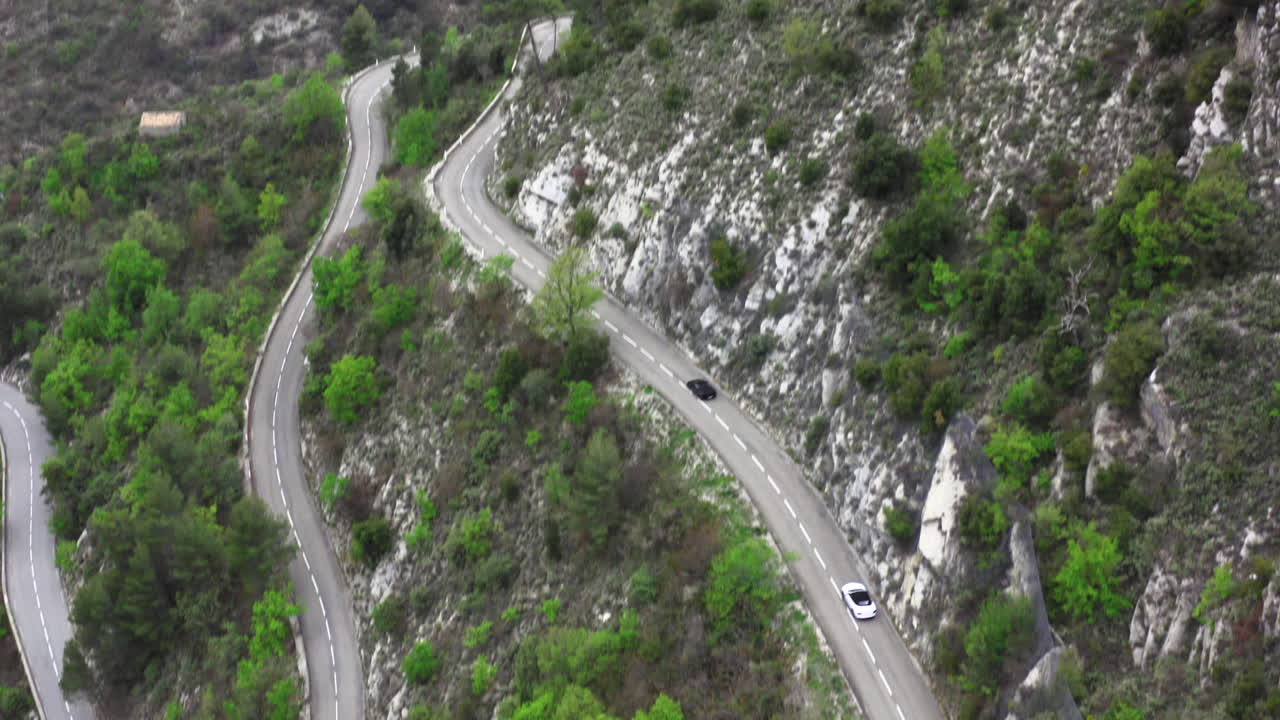 Aerial View of Cars on a Winding Mountain Road