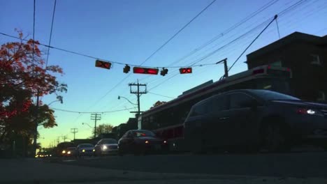 Early-morning-time-lapse-of-speedy-rush-hour-traffic-and-pedestrian-crosswalk-in-east-end-Toronto