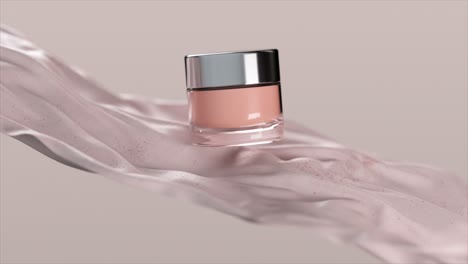 frasco de crema rosa en una maqueta de tela