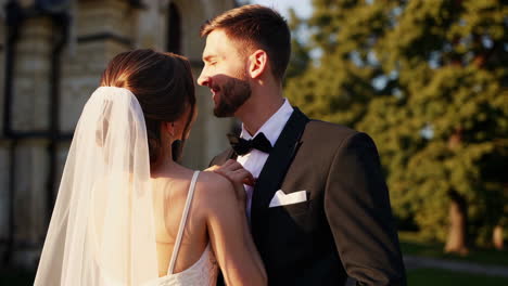 wedding couple in front of a church