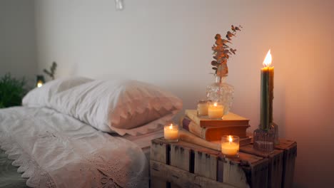 Rustic-bedside-table-with-books-and-decorations