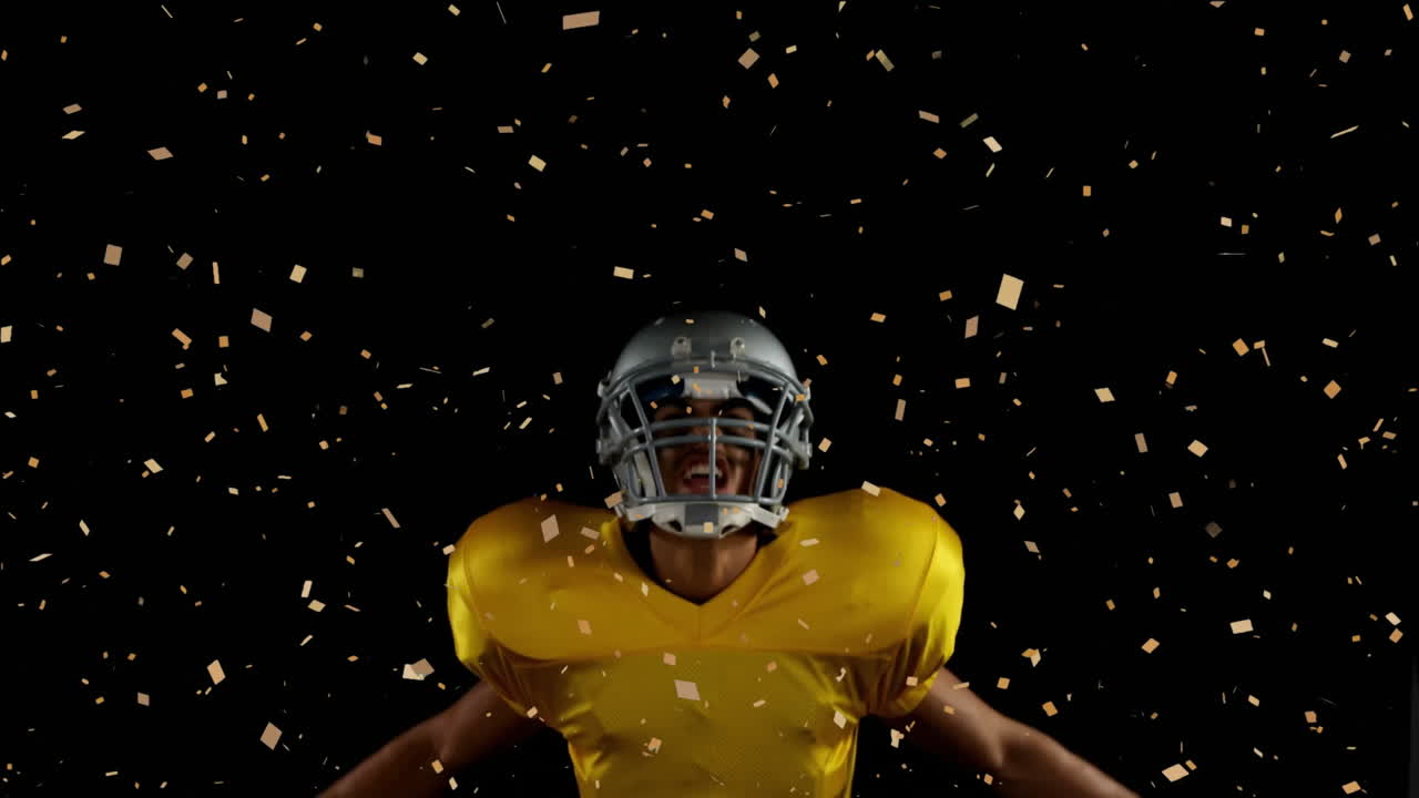 Celebrating with confetti, football player in yellow jersey on field