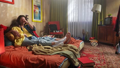 couple relaxing in a retro bedroom