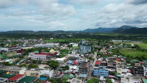 a breathtaking aerial footage of a small island town virac showcases its unique culture, lifestyle, and natural beauty