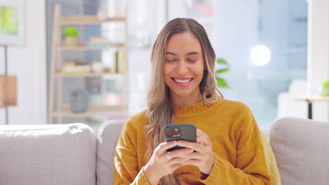 Happy,-woman-and-texting-on-cellphone-at-sofa