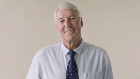 portrait of elderly successful businessman smiling