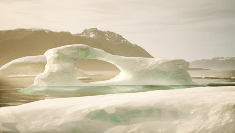 stunning iceberg arch in a frozen landscape