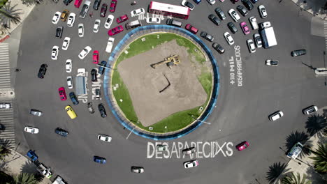 aerial shot at paseo de la refoma avenue of the demand for social justice in mexico at noon